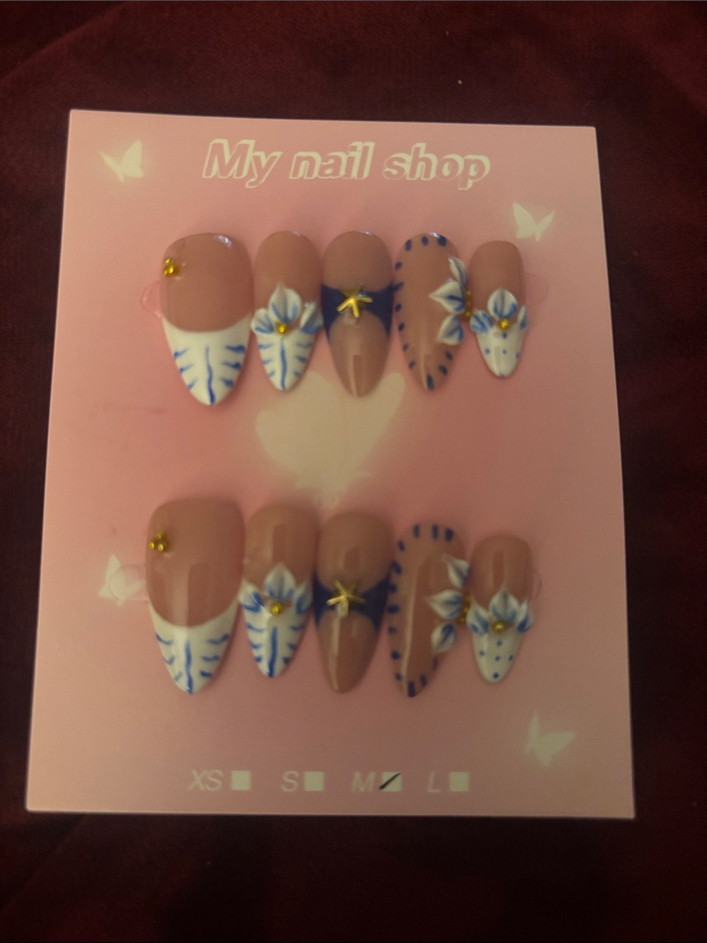 Neutral Beige Press-On Nails with Blue Floral Accent